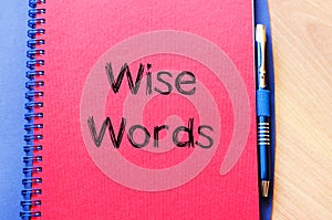 Wise words concept on notebook