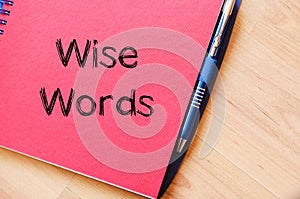 Wise words concept on notebook