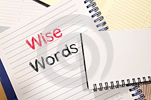 Wise words concept on notebook