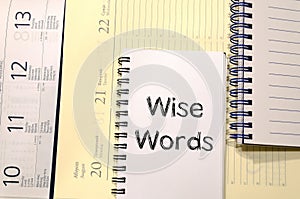Wise words concept on notebook