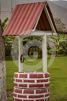 Wish Fountain with Natural Landscape Background photo