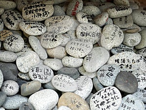 Wish rocks, prayers write their wishes and left in Zenkoji Temple