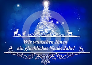 We wish you a Merry Christmas and a Happy New Year written in German - season`s greeting card with blue background