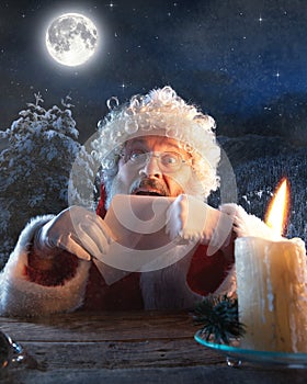 Emotional Santa Claus congratulating with New Year and Christmas, sending a letter, wish list in midnight with candle