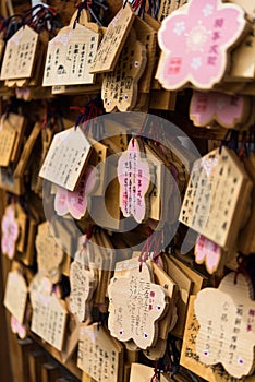 Wishes and prayers written outside temple in Japan