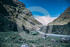 Wishing Bridge of Gap of Dunloe, a narrow mountain pass forged between the MacGillycuddy Reeks and Purple Mountain