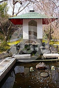 Wishing well at temple in Kyoto photo