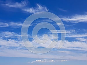 Wispy cirrus clouds in a blue sky