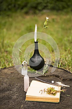 Witch altar with open recipes spell book