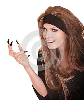 Witch in black costume with claw finger.