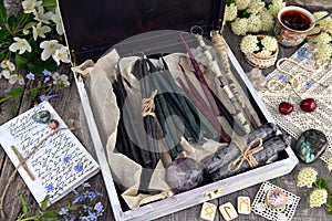 Witch box with hand made candles, crystal, runes, flowers and magic objects