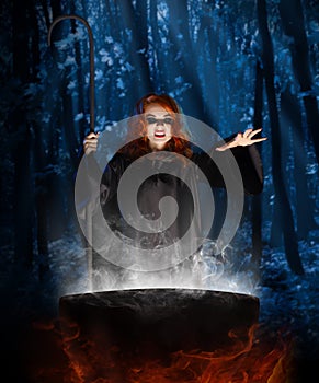 Witch with cauldron at night forest