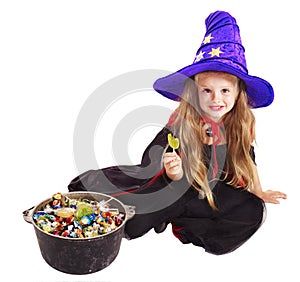 Witch child with candy.