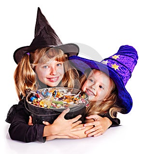 Witch children with trick or treat.