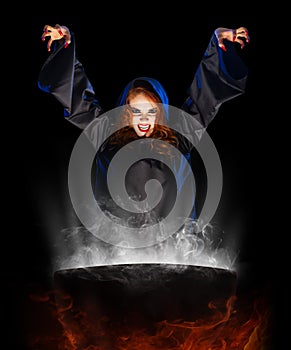 Witch girl with cauldron