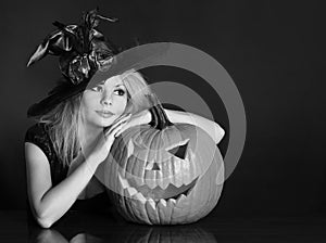 Witch with Halloween pumpkin