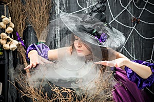 Witch in a hat cooking a love potion