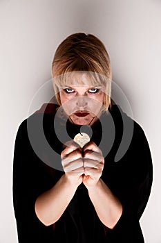 Witch holding Talisman photo