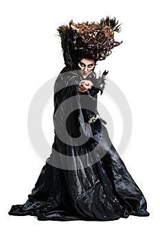 Witch pointing with her finger towards the camera