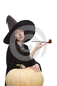 Witch posing with a pipe