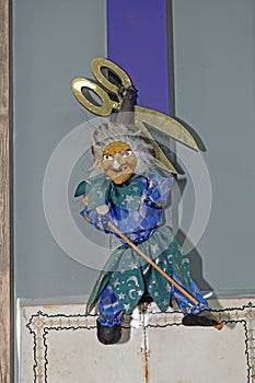 Witch puppet hanging on the wall