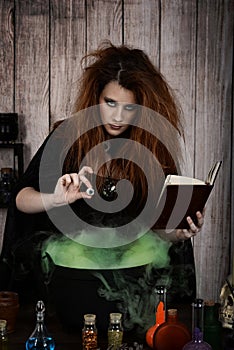 Witch with spell book and an eye