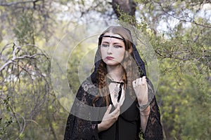 Witch women during Halloween in the forest