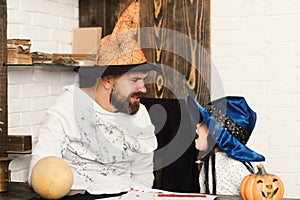 Witcher and little magician make Halloween decor. Halloween party concept