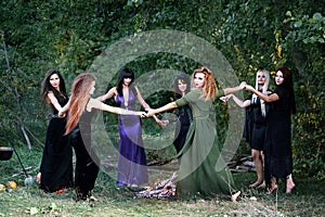 Witches dancing in the forest