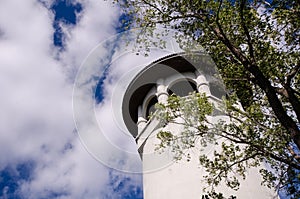 Witches Hat Water Tower in Prospect Park, Minneapolis Minnesota, on a partly cloudy day