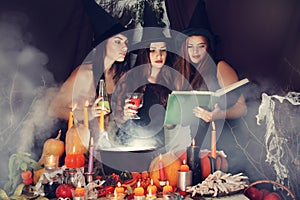 Witches look into the book, tinted