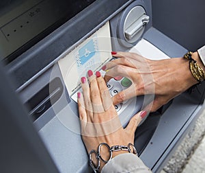 withdrawing money at atm photo