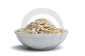 Withe bowl with oat flakes