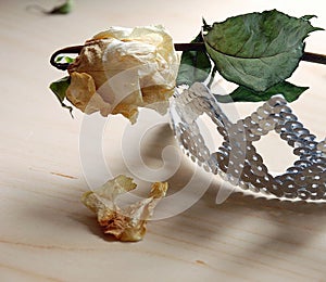 Withered rose and crown