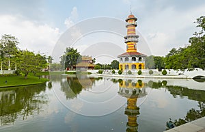 Withun Thasana Tower with hazy sky at Bang Pa In summer palace in Ayutthaya