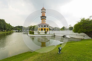 Withun Thasana Tower with hazy sky at Bang Pa In summer palace in Ayutthaya