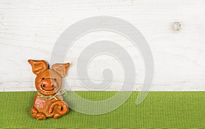 Witty and humorously new years greeting card with a handmade pig photo