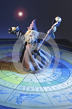 Wizard Figurine on Tarot Board