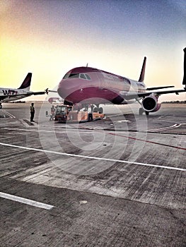 Wizz Air plane at boarding gate