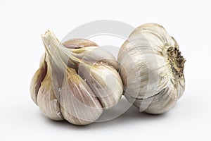 Wo large heads of garlic isolated on a white background