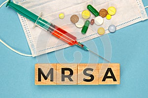 Wodden cubes with words MRSA. Medical concept