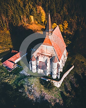 The Wofgangskirche, a gothic Catholic Church in the austrian Village Kirchberg am Wechsel aerial view photo