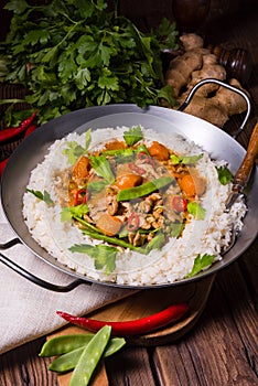 Wok pan with meat strips and vegetables photo
