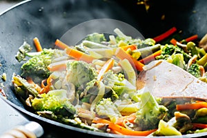 Wok stir fry with vegetables photo