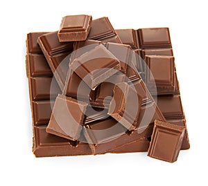 Wole tile of milk chocolate and slices photo