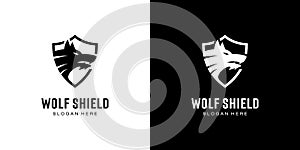 Wolf head and shield logo vector design