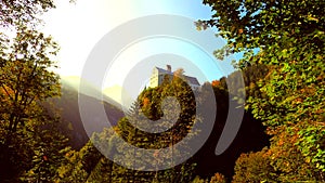 Wolfsklamm gorge in Austria monastery on a hill on a rock in autumn tilt down in 4K HD