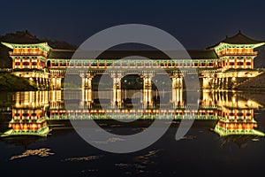 Woljeong Bridge - traditional Silla bridge in gyeongju South korea. Reflection at night in river