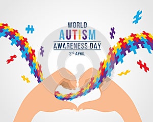 Wolrd Autism Awareness Day banner with Hands In A Heart Shape and colorflu puzzle ribbon around vector design photo