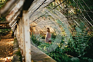 Woma tourist exploring a tropical hothouse